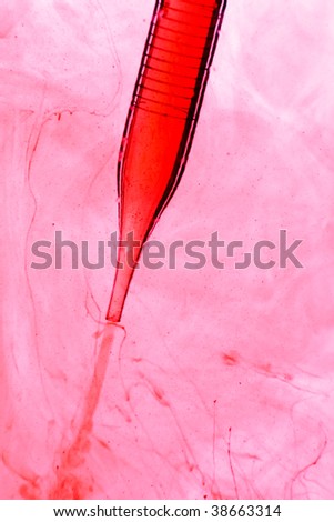 Pipette with red liquid