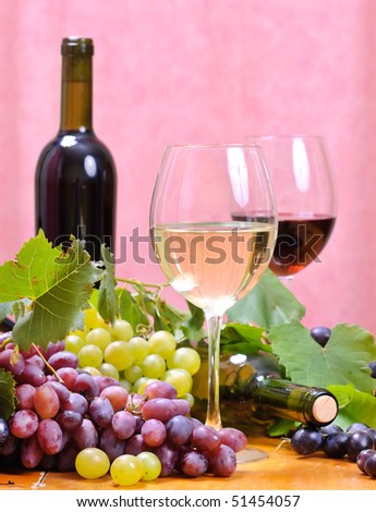 Wine glass with bottle of wine