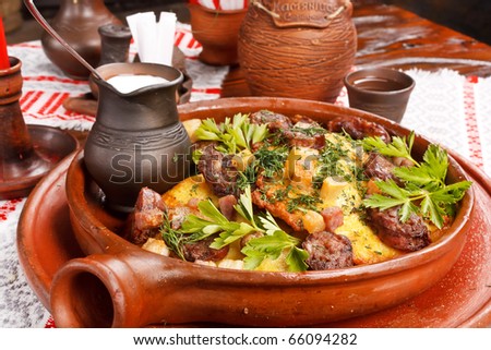 meat with potatoes in the pot