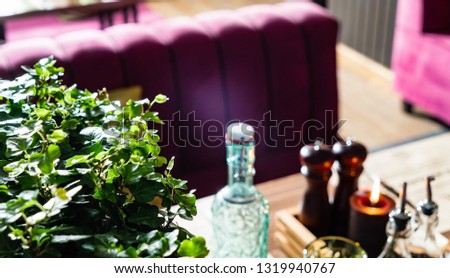 Interior of cozy restaurant. Contemporary design in loft style, modern dining place and bar counter