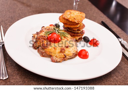 meat with potato pancakes