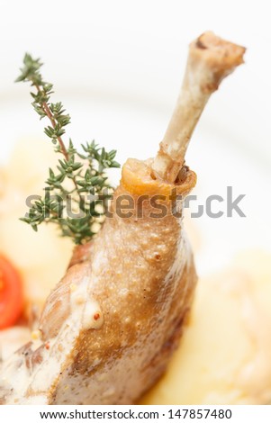 Duck leg roasted with potato
