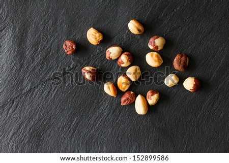 nuts on black background