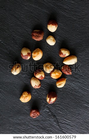 nuts on black background