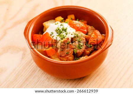 meat and vegetables in the pot