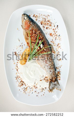 trout fish baked with nuts