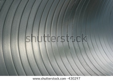 abstract close up of the interior of a large steel air tube