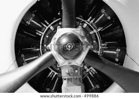 an old aircraft propeller engine, abstract frontal shot converted to b&w