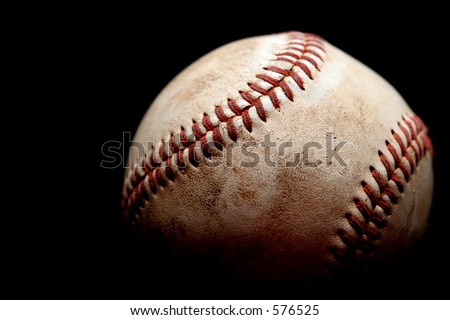 used baseball macro over black, shallow depth of field