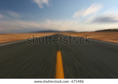 endlessly long road, warped in-camera with zoom and camera on tripod