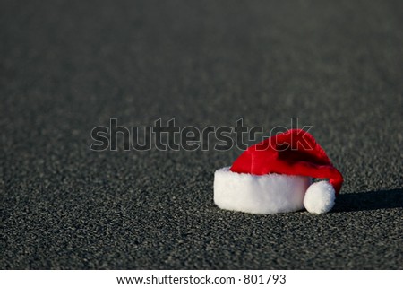 lost santa hat on the highway. horizontal version with shallow dof.