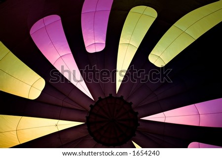 hot air balloon - abstract burst of color, interior shot with envelope during inflation