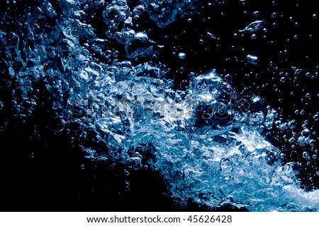 burst of air bubbles in water