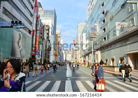 TOKYO - 10 November 2013 Ginza road in the weekend. One of the famous shopping street in Tokyo, Japan. On the weekend, this road will became a walking street for shopping and street performances