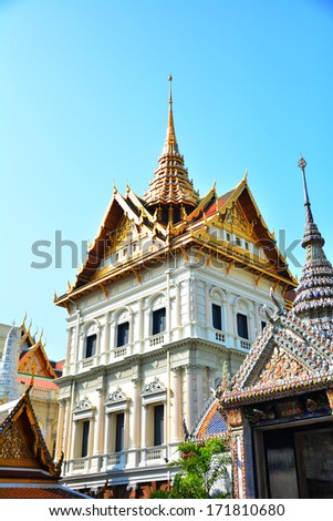 BANGKOK -  JAN 9 2014 : The Grand Palace, the iconic landmark in Bangkok, Thailand. The palace area contains a cluster of palaces and also the Emerald Buddha Temple which is really famous
