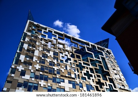BIRMINGHAM, UK - 21 July 2013 - The Cube Building on the Gas Street near Brinley Place area. This building is constructed with a modern style and located by the canal