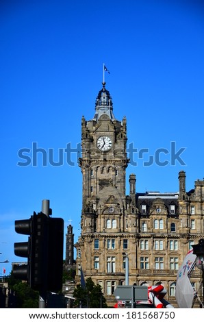 EDINBURGH, SCOTLAND, UK - 19 July 2013 : Edinburgh city scenery. The clock tower is the one of the landmarks of this magical city.