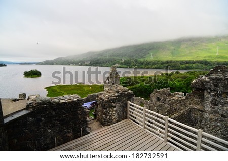 DALMALLY, SCOTLAND- 18 JULY 2013: A scene from Kilchurn Castle, a 14th century ruin at the head of Loch Awe, in Argyll and Bute, Scotland. It used to an be original powerbase of Clan Campbell.