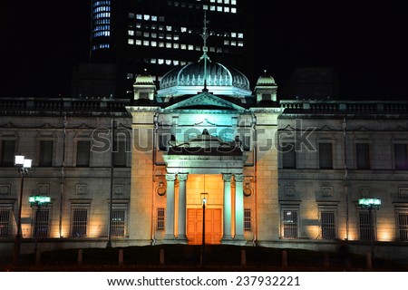 OSAKA, JAPAN - 9 December 2014 - Osaka Prefectural Nakanoshima Library at night. It made with the western style with the green dome in the middle