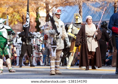 ATLANTA, GA - DECEMBER 1:  Characters from the Star Wars movies walk down Peachtree Street while taking part in the annual Atlanta Christmas parade on December 1, 2012 in Atlanta, GA.