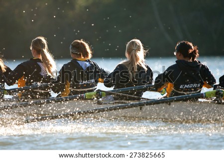 ATLANTA, GA - NOVEMBER 22:  The women\'s crew team from Emory University rows down the Chattahoochee River on a cold fall morning to warm up for an upcoming race on November 22, 2014 in Atlanta, GA.