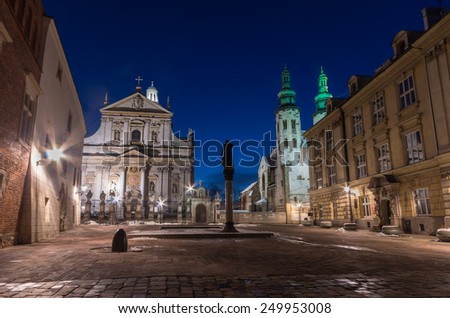 Krakow, Poland, Saint Mary Magdalene square with baroque church of Saints Petr and Paul and romanesque church of Saint Andrew