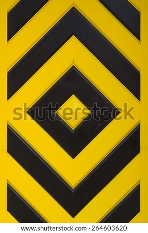 Door to the fortress, painted yellow and black