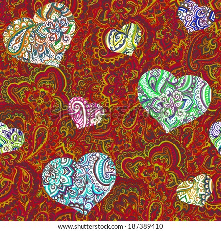 Bright seamless ornamental pattern with indian royal ornament and ethnic hearts on colorful oriental background