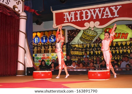 RENO, NEVADA - CIRCA JULY 2009.The acrobat show in Circus Circus.The new Imperial Acrobats of China troupe is multi-talented performing shows that include Aerial Silks, Hand Balance, and a Hula Hoops.