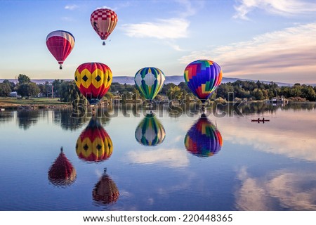 PROSSER, WA - SEPTEMBER 27, 2014. The 25th Annual Great Prosser Balloon Rally. Giant balloons fly over Yakima river