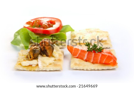 Isolated mixed hors d\'oeuvres on white background