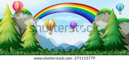 Balloons flying in the sky over mountains