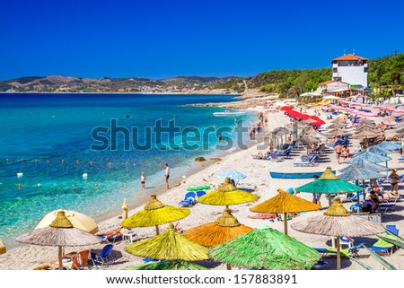 Thassos, Greece - Sept. 19: Beautiful Pefkari Beach Near Potos, Tourists Enjoying A Nice Summer Day At The Beach In Thassos On September 19, 2013 In Thassos, Greece