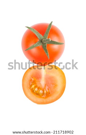A red and yellow tomato sliced Ã?Â¢??Ã?Â¢??isolated on white background. located vertically