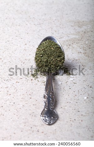 Spoon with spices. Tinted. Shallow depth of field