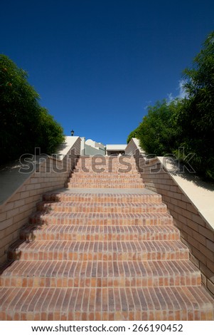 Stairs to heaven, built of brick between the trees.
