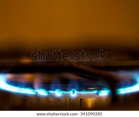 Flame on a gas-burner. Shallow depth of field. Blured.