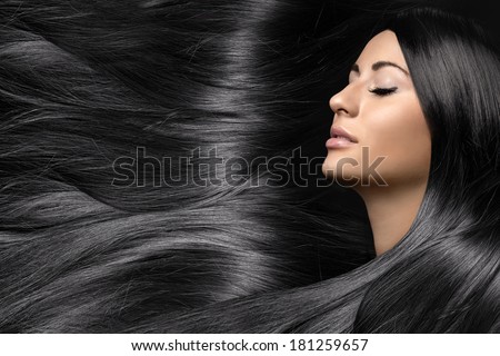 beautiful young woman with healthy long shiny hair