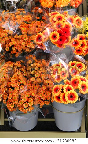 Mix of vivid  fresh beautiful flowers selling outside
