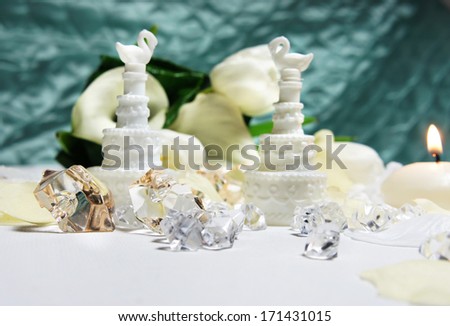 Beautiful wedding bouquet of white callas and tulips and other wedding decorations
