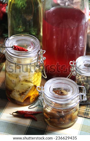 Mix of homemade canned delicious food in the beautiful jars