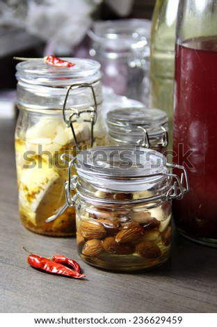 Mix of homemade canned delicious food in the beautiful jars