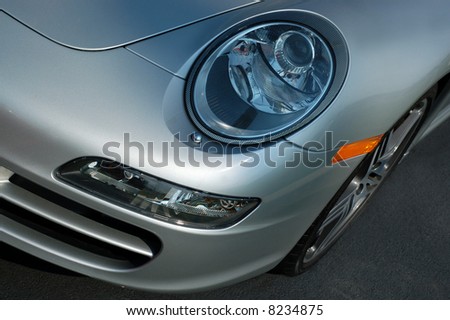 Front left side of a silver German sports car