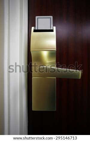 Picture of a hotel room electronic door lock with a keycard