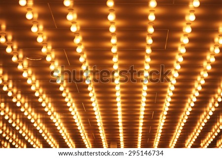 Theatre Lightbulbs - Picture of rows of theater marquee lights on an old theater