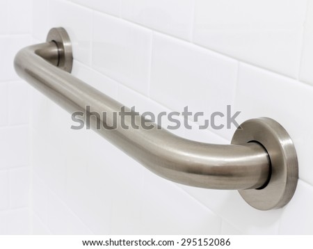 Picture of grab bar handrail in a hotel handicapped disabled access bathroom