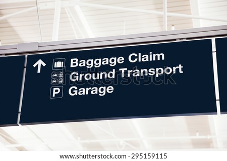 Airport baggage claim sign with Ground Transport and Garage