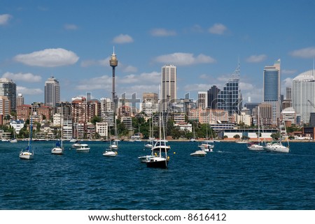 Australia, Sydney seafront with sky-scrapers, yachts and sunshine