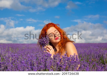Denuded girl on the lavender field