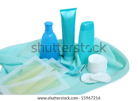 Household items for cleanliness and hair-removing on a satin background